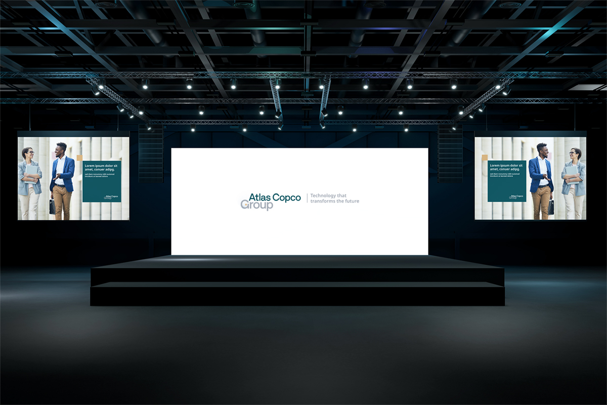 Atlas Copco Group white logotype for large screens, with images on side screens 